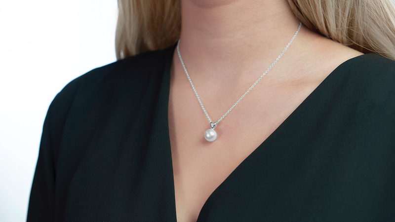 Model is wearing Lev Pendant with 9-10mm AAAA quality pearls